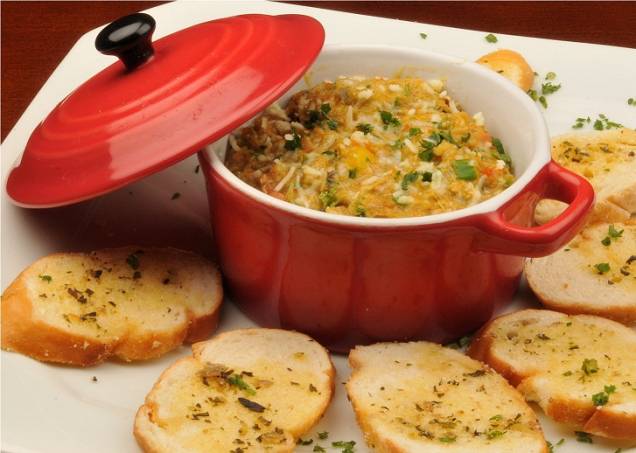 Panelinha de siri acompanhada por torradinhas gratinadas com queijo e creme de alho (R$ 16,00)<br> Panelinha de siri acompanhada por torradinhas gratinadas com queijo e creme de alho (R$ 16,00)<br>
