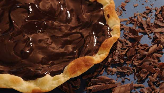 Pizza de chocolate extremamente cremosa, com creme de leite.<br>