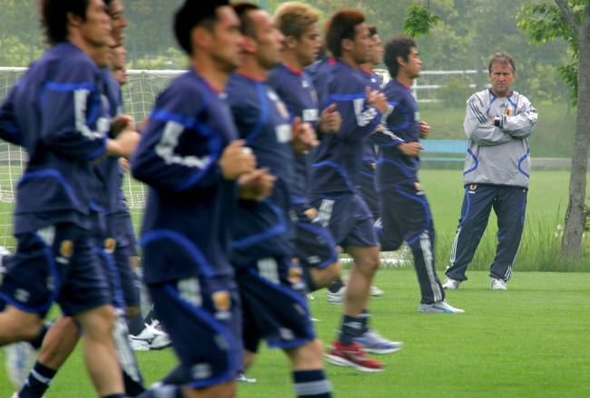 Japan soccer manager Zico watches his player at J-Village in Naraha town, northern Japan