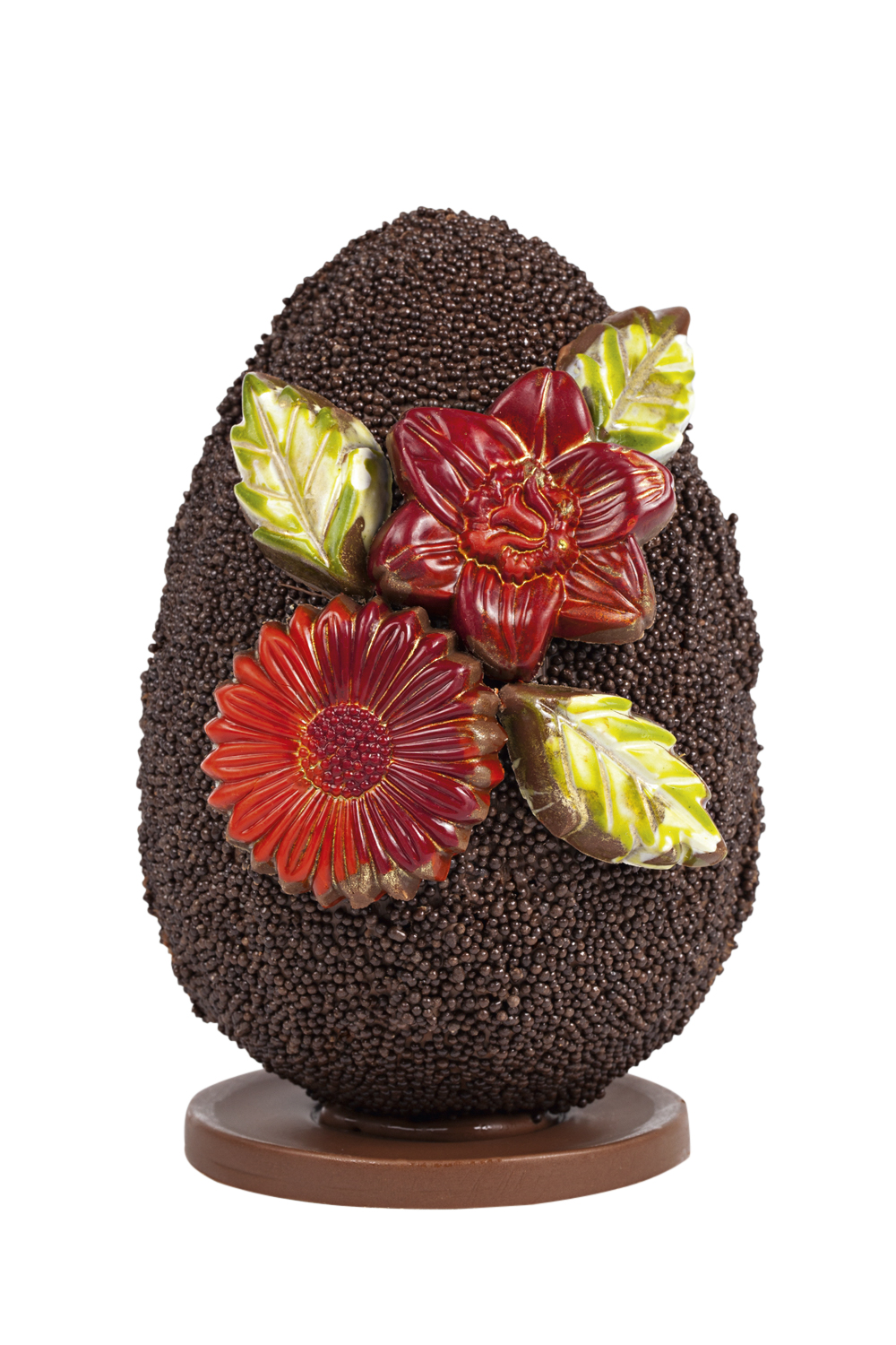 Beth-Chocolates_foto-Rodrigo-Azevedo_20160302_0072.jpg Decorada com aplique de flores e folhas pintadas a mão, além de miniconfeitos crocantes, a criação da Beth Chocolates é feita de chocolate belga com 70% de cacau de São Thomé. 145 reais (300 gramas) pelo site www.bethchocolates.com.br ou ☎ 99982-4045.
