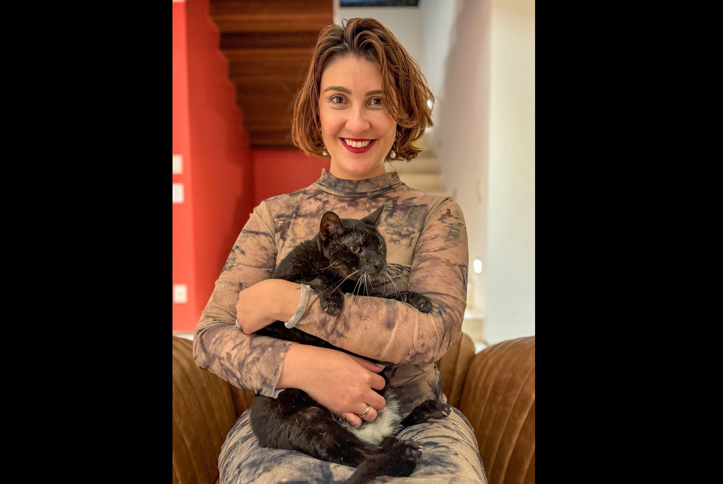 Editora Rafaella Machado e o gato sensitivo