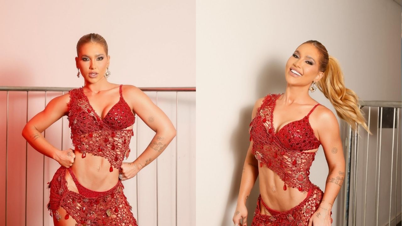 Com fantasia vermelha, Virginia recebe elogios pelo samba no pé em ensaio